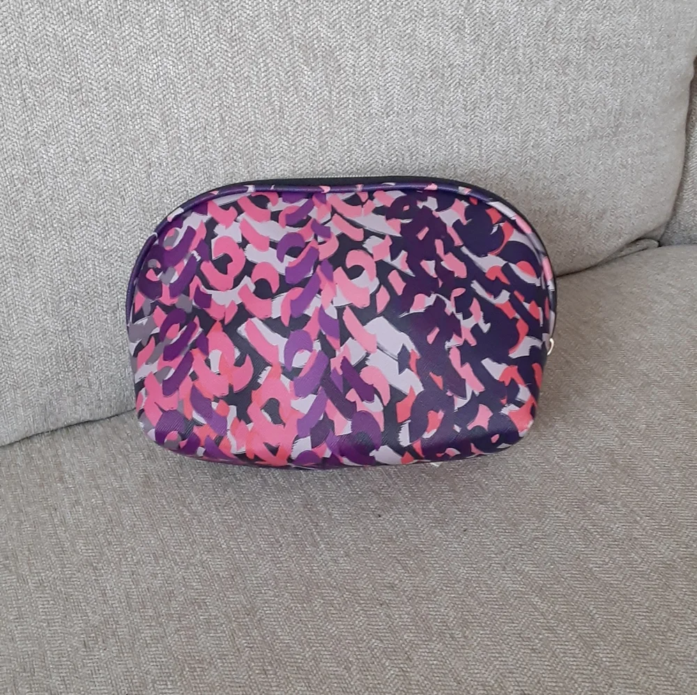 Trina Turk multi color print leather makeup bag